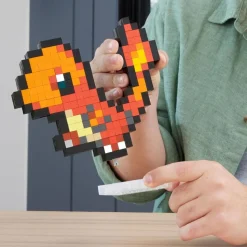 Mattel HTH76 - MEGA - Pokémon - Glumander Pixel Art Bauset – 349 Teile – Retro-Sammelfigur zum Bauen & Ausstellen